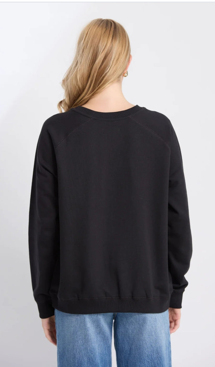 Stella and Gemma black Star Cross sweater